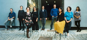Manifold group shot - artists standing in front of studios